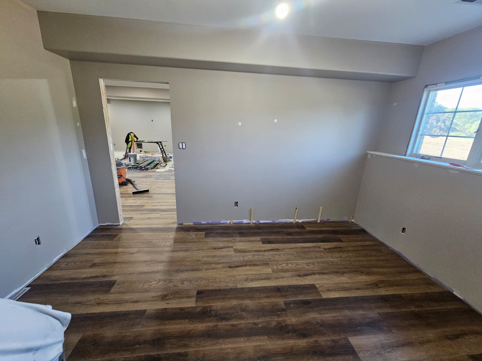 Finished basement flooring and paint package example relevant to Frankfort-area remodels
