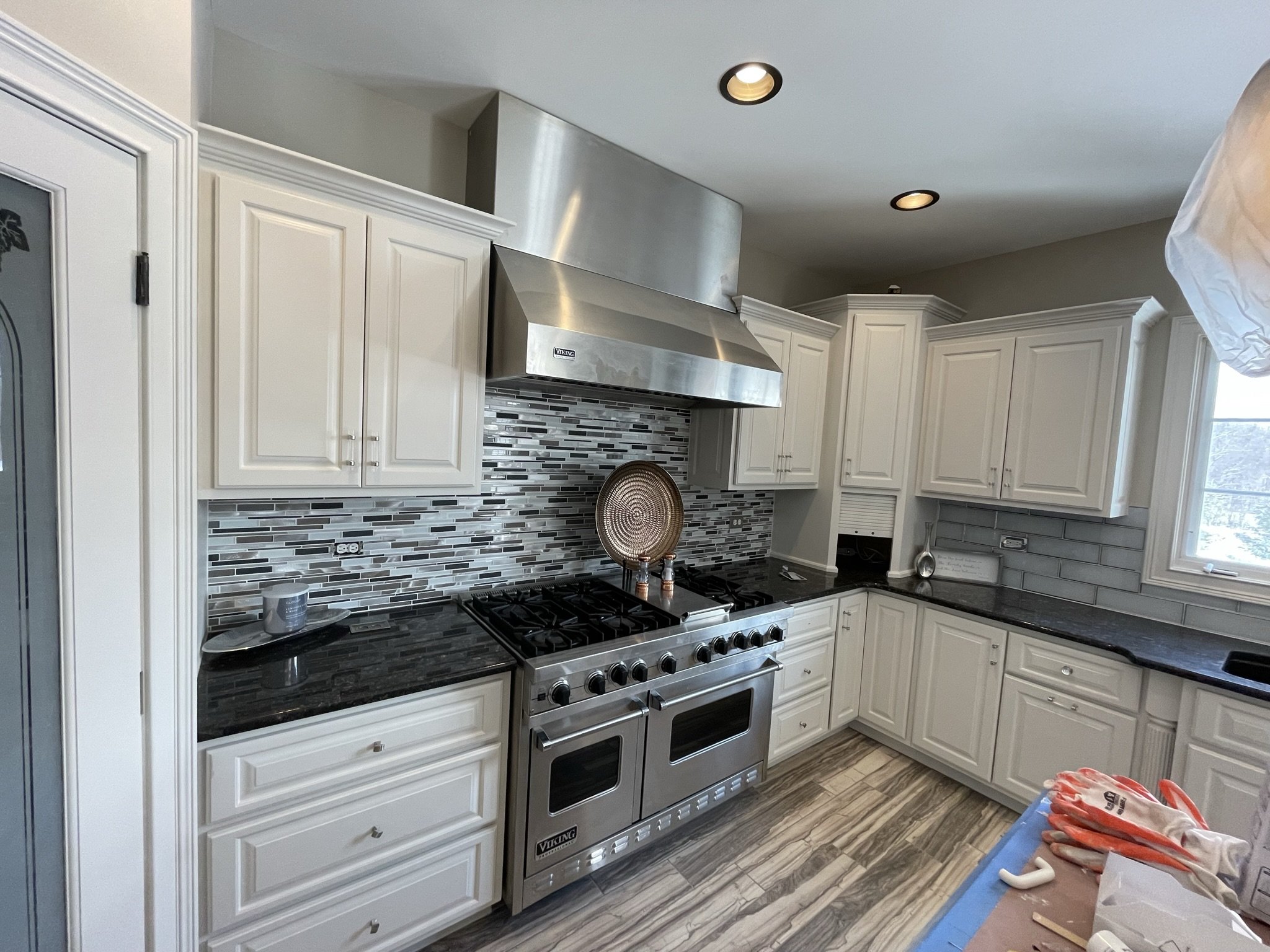 Kitchen cabinet painting example — finish option available to Bradley Illinois homeowners