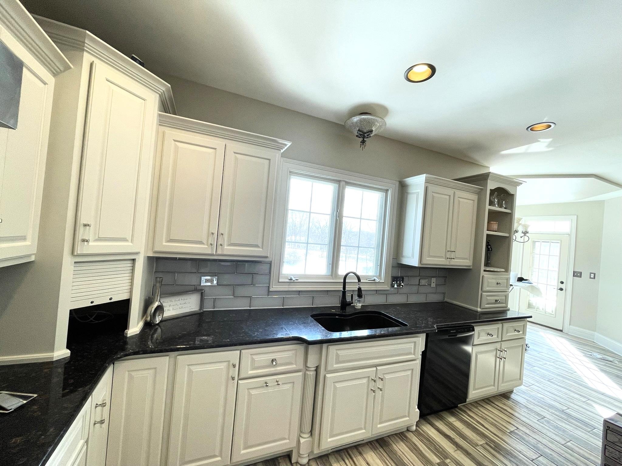 Cabinet refinishing Bourbonnais IL factory finish oil-based primer self-leveling paint